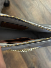 COACH Clutches