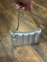 COACH Clutches